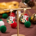 Orecchini pendenti Babbo Natale con perni a stella e decorazioni natalizie festive - Babbo Natale Legge Stella