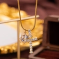 Goldene Schlangenkette mit zirkonbesetztem Kreuz und Sonnenblumen-Doppelanhänger - Buchstabe T