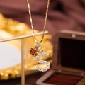 Gold rope chain necklace with crystal-paved letter S and red heart charms - Letter S