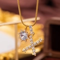 Goldene Schlangenkette mit rundem Zirkon und X-Buchstaben-Anhänger im Luxus-Stil - Buchstabe X
