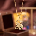 Elegant gold plated letter S pendant necklace with shimmering zircon stones - S