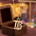 Elegant gold plated letter B pendant necklace with sparkling cubic zirconia crystals - Letter B
