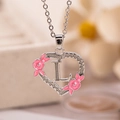Collana a cuore argento con lettera L e dettagli di fiori in smalto rosa - Lettera L / Argento