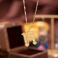 Gold letter H pendant necklace with micro-paved zircons and delicate link chain - Letter H