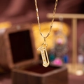 Gold tone necklace featuring a number 1 pendant inlaid with sparkling white zircons - Letter I