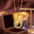 Zirconia studded gold necklace featuring a hollow round pendant and wave chain - Letter O