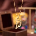 Elegant gold-plated necklace with letter P pendant encrusted with cubic zirconia - Letter P