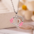Collana a cuore argento con lettera D e dettagli floreali in smalto rosa e catena - Lettera D / Argento