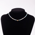 Rainbow seed bead necklace with gold heart pendant featuring a letter L engraving - Letter L