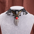 Gothic black lace choker with bronze skull wings and a red rose pendant detail - Black Lace Skull Wings Rose Style