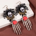 Gothic skull earrings with black lace, bone palm charms, and small red rose accents - Skull Hand Rose Earrings Style