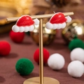 Orecchini a cappello di Babbo Natale rossi e bianchi su un supporto in metallo dorato - Cappello di Natale