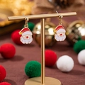 Orecchini festivi con Babbo Natale smaltato su supporto dorato con decoro natalizio - Babbo Natale