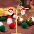 Orecchini festivi a lobo a forma di Babbo Natale in smalto rosso e finitura oro - Testa di Babbo Natale