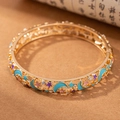 Bracciale rigido dorato bohémien con ritagli di luna e stelle in smalto e cristalli - Luna Stella-Blu