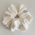 Premium white velvet scrunchie with soft texture and Made in Korea woven label - Off-white