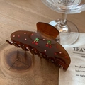 Detail of a brown translucent hair claw clip with colorful rhinestone cherry pattern - Coffee Translucent Cherry Claw Clip