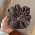Detailed view of large dark brown corduroy scrunchie with soft ribbed velvet texture - Dark Coffee