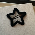 Elegant black velvet star-shaped snap hair clip with a minimalist fabric finish - Black Star Style