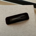 Elegant black velvet rectangular BB hair clip with central cutout on a textured surface - Brown Square Style