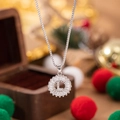 Silver pendant necklace with crystal letter L in a sunburst design for women - L