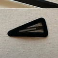 Elegant black velvet triangular BB hair clip with soft flocking texture on beige fabric - Black Large Triangle Style