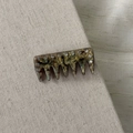 Close-up of retro marble acetate hair clip with sparkling inlaid rhinestones - Grey Green