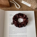 Retro dark brown pleated leather scrunchie for women with elegant vintage props - Brown