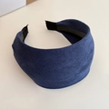 Detail shot of the navy blue suede texture and non-slip lining on the wide headband - Navy Blue