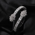 Macro shot of silver Hamsa Hand bangle featuring baguette-cut and round cubic zirconia - Silver 8inch Palm Bracelet