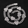 Close-up of hip hop silver Cuban chain necklace with iced out heart baguette pendants - 7 Inch Bracelet / Silver