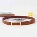 Brown leather belt with gold rectangular buckle shown on white surface with decor - 105 / Camel