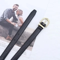 Women's slim black leather belt featuring a classic golden D-ring buckle and stitching - Gold Horseshoe Buckle Style / Black