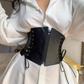 Detail view of a black vintage corset belt with front zipper and side lace-up design - Black / 68cm