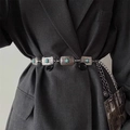Detailed view of bohemian metal chain belt with turquoise stones and floral pendant charm - Rectangle Silver