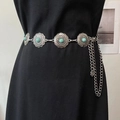 Detail of bohemian silver waist chain with turquoise carvings on black dress - Round Silver