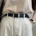 Classic black leather belt for women with matte gold oval buckle on white trousers - Black