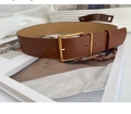 Close-up of a vintage brown leather belt with a matte gold rectangular buckle - 100cm / Brown