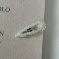 Close-up of sparkling heart-shaped crystal BB hair clip with silver metal base - Water Drop Shape / White Waterdrop