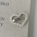 Close-up of heart-shaped hair clip with clear crystal beads and silver metal base - Heart Shape / White Heart