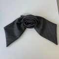 Detail of grey striped fabric hair claw with an elegant rose-shaped folded fabric design - Rose Spring Clip
