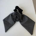 Detail of grey striped fabric rose and bow hair scrunchie with elegant suit texture - Rose Scrunchie