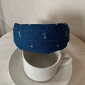 Detail of dark blue denim headband featuring white crisscross embroidery texture - Medium Blue & White