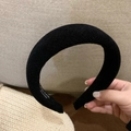 Klassisches schwarzes gepolstertes Stirnband mit Rippstruktur und breitem Design - Schwarz