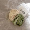 Textured cream and sage green elastic scrunchies set on minimalist background - Avocado Green