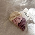 Detailed macro view of three knitted texture elastic hair ties in neutral and deep colors - Dark Plum Purple