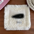 Elegante schwarze Tropfen-Haarspange mit Strass auf strukturiertem Hintergrund - Schwarz