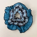 Close-up of vintage blue plaid scrunchie with layered contrast edges and cotton texture - Blue Plaid Lace Scrunchie