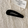 Elegant black velvet BB hair clip with soft flocking texture on a minimal woven background - Waterdrop Style / Black