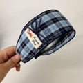 Detail of blue plaid headband with a cute bow and Sweater Dog fabric label - Blue Plaid Wide Headband